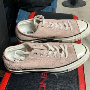 Pink suede Chuck Taylor Converse sneakers